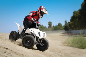 kid riding Razor Dirt Quad 500 electric quad